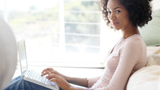 A young woman on a laptop