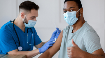 Man getting COVID Vaccine