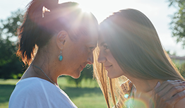 Mother and daughter in the sun