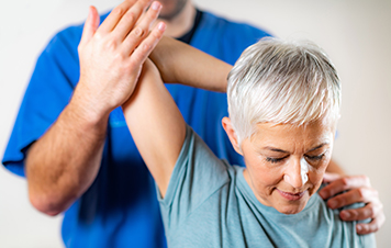 Woman getting phyiscal therapy